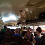 Belize bus with travelers