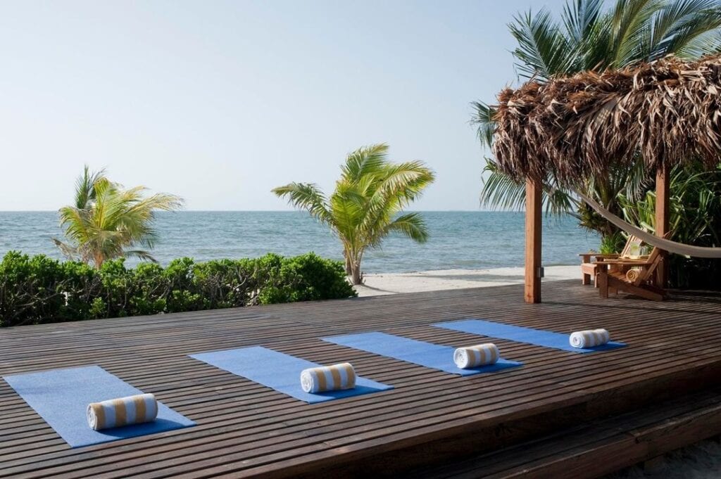 Beach Yoga at Turtle Inn in Placencia, Belize